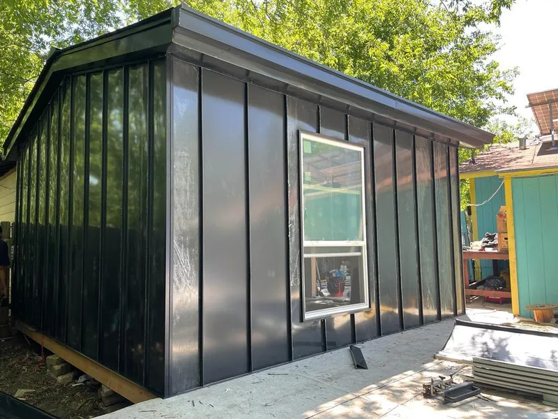 Black standing seam metal wall panels for Roof Inspection in Minnehaha