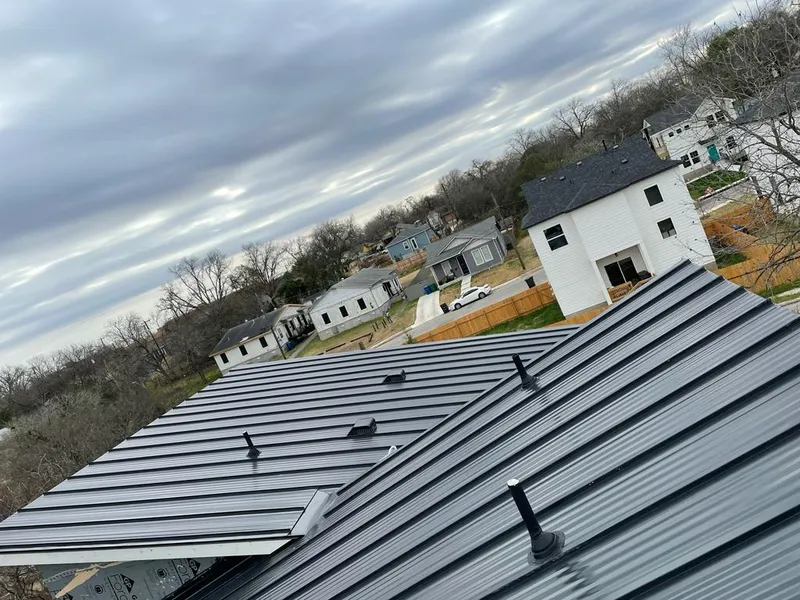 Standing seam metal roof panels with vents for Skylight Repair in Minnehaha